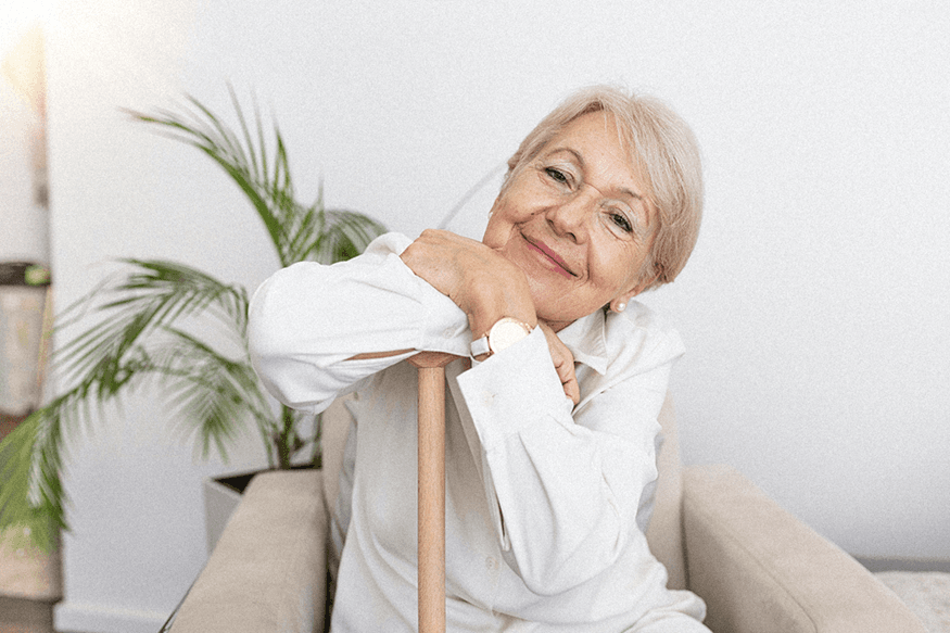 elderly woman happy dressed in white