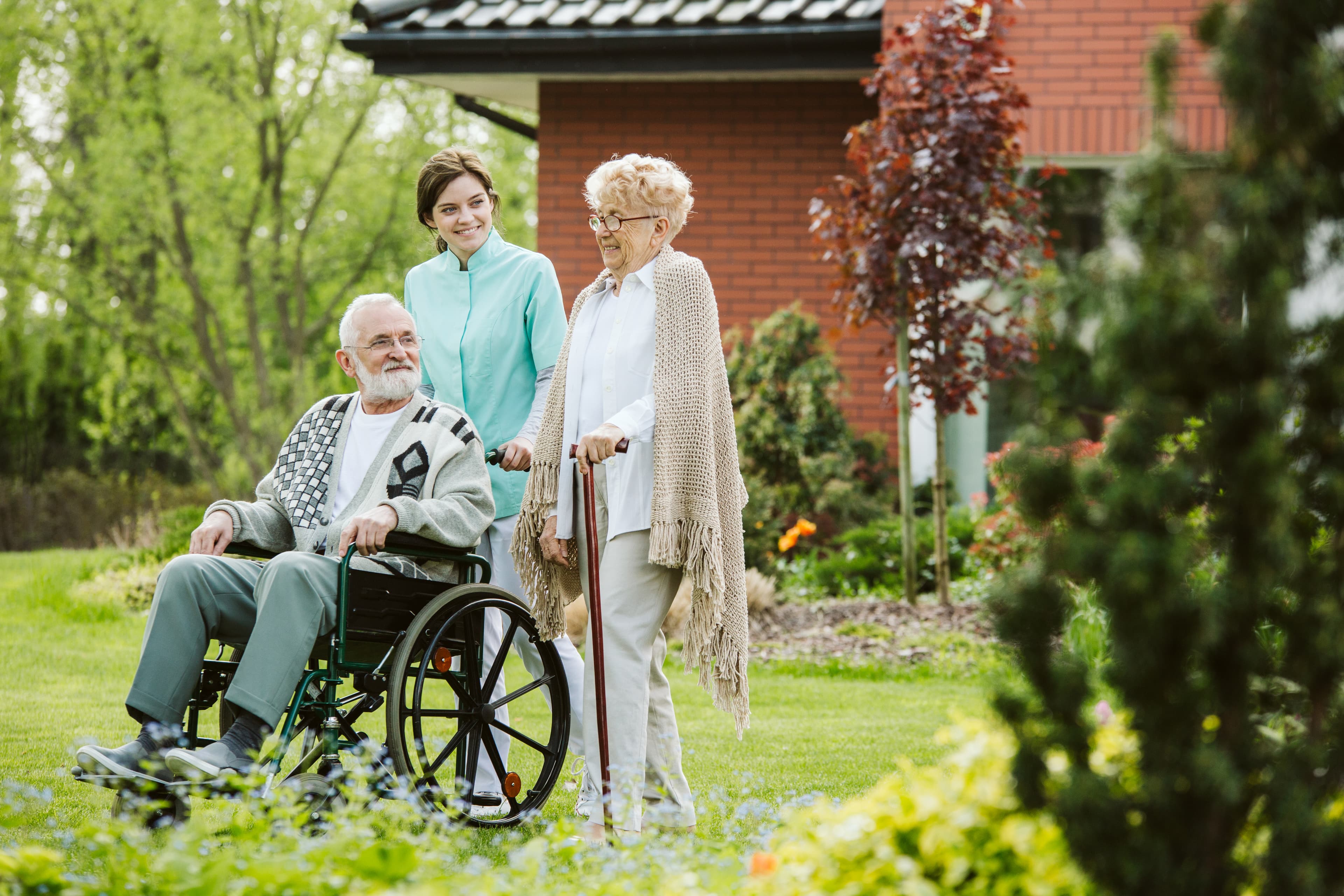 Healthcare professional caring for a resident in a long-term care facility
