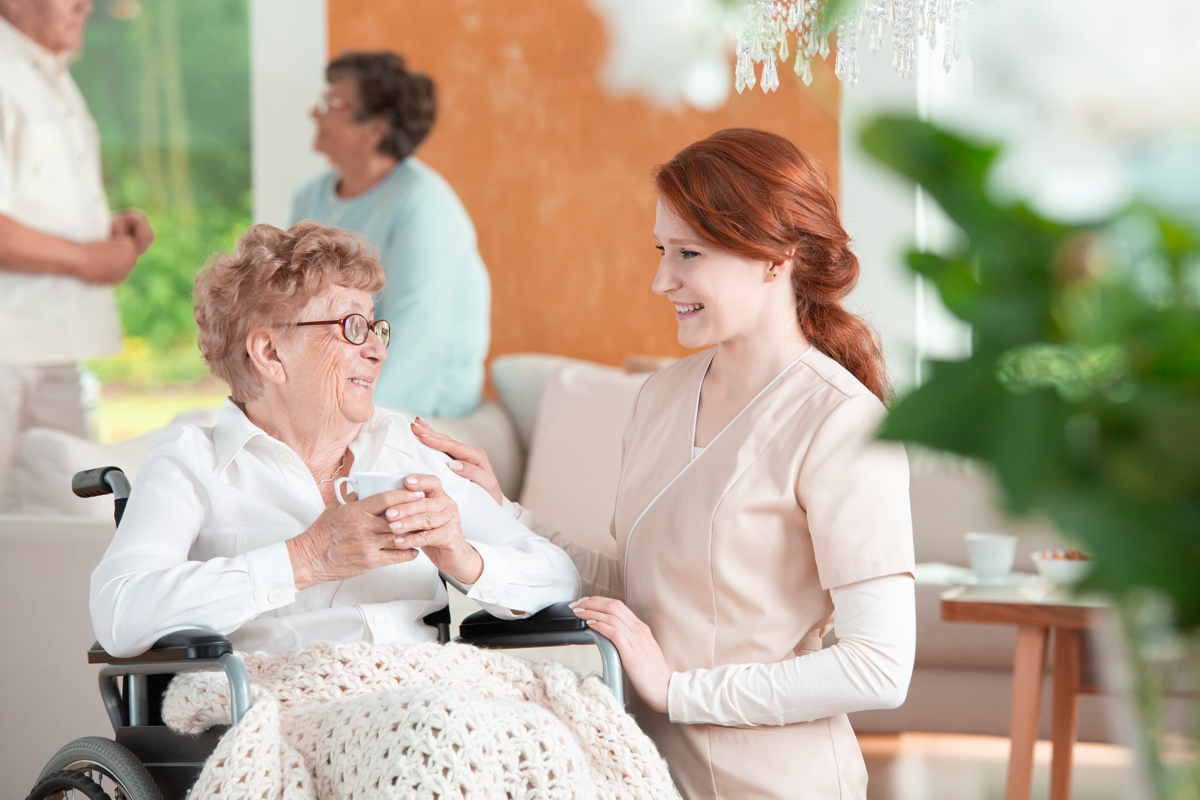 Compassionate caregiver providing hospice support to a patient
